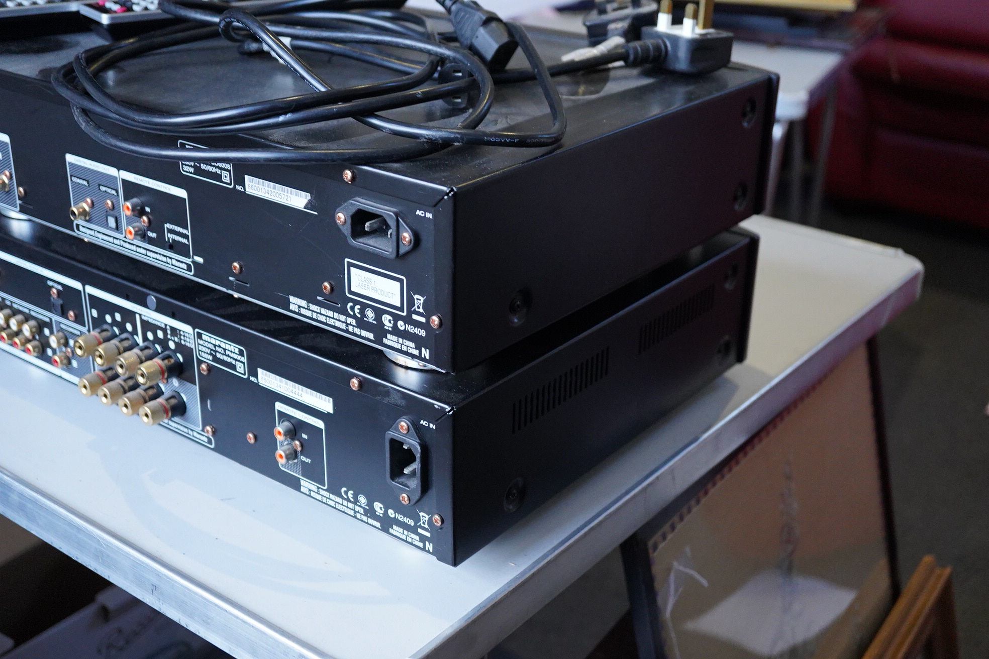 A Marantz HiFi integrated amplifier PM6005, together with a CD player CD6005, plus two remote controls and power leads